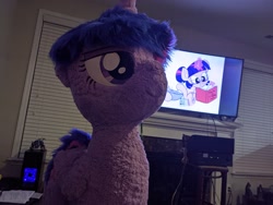 Size: 4032x3024 | Tagged: safe, artist:joltage, artist:sweetfilthyfun, imported from twibooru, photographer:corpulentbrony, twilight sparkle, alicorn, cooking, fireplace, fluffy, high res, irl, photo, plushie, standing, television, twibooru exclusive, twilight sparkle (alicorn), window