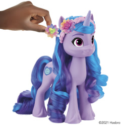 Size: 2000x2000 | Tagged: safe, imported from derpibooru, izzy moonbow, human, pony, unicorn, accessories, accessory, brushable, female, flower, flower in hair, g5, headband, high res, irl, irl human, mare, official, photo, toy, unicorn charms izzy moonbow