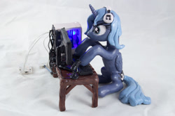 Size: 1280x854 | Tagged: safe, artist:azgchip, imported from derpibooru, princess luna, alicorn, pony, gamer luna, angry, computer, computer mouse, craft, female, folded wings, gaming, grimace, headphones, keyboard, mare, microphone, monitor, photo, rgb, s1 luna, sculpture, sitting, solo, table, wax, wings, wires