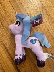 Size: 3024x4032 | Tagged: safe, imported from derpibooru, photographer:errant_harpy, izzy moonbow, pony, unicorn, female, g5, irl, mare, my little pony: a new generation, photo, plushie, toy