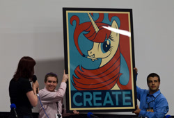 Size: 1600x1087 | Tagged: safe, imported from derpibooru, oc, oc:fausticorn, alicorn, human, pony, bronycon, bronycon 2012, irl, irl human, lauren faust, photo, poster