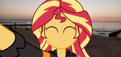 Size: 1920x910 | Tagged: safe, imported from derpibooru, sunset shimmer, equestria girls, beach, close eyes, equestria girls in real life, eyes closed, hand, irl, ocean, photo, smiling, solo, sunset