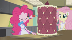Size: 3410x1920 | Tagged: safe, imported from derpibooru, screencap, fluttershy, pinkie pie, acadeca, equestria girls, friendship games, apron, cake, clothes, female, food, hairpin, smiling, tanktop