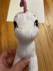 Size: 3024x4032 | Tagged: safe, imported from derpibooru, photographer:errant_harpy, zipp storm, pegasus, pony, female, g5, irl, looking at you, mare, my little pony: a new generation, photo, plushie, toy