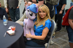 Size: 3009x1993 | Tagged: safe, artist:172rainbow, artist:nazegoreng, imported from derpibooru, twilight sparkle, alicorn, human, babscon, babscon 2017, irl, irl human, photo, plushie, tara strong, twilight sparkle (alicorn), voice actor, voice actor joke