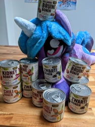 Size: 3024x4032 | Tagged: safe, imported from derpibooru, izzy moonbow, beans, canned food, cans, dutch, food, g5, gekoloniseerd, heart eyes, herbivore, irl, izzy's beans, my little pony: a new generation, photo, plushie, poster, that pony sure does love beans, wingding eyes