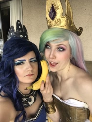 Size: 1538x2048 | Tagged: safe, artist:sarahndipity cosplay, imported from derpibooru, princess celestia, princess luna, human, banana, bare shoulders, clothes, cosplay, costume, do you like bananas?, everfree northwest, everfree northwest 2018, food, irl, irl human, luna is not amused, open mouth, photo, unamused