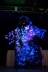 Size: 829x1242 | Tagged: safe, imported from derpibooru, tantabus, human, christmas, christmas lights, clothes, cosplay, costume, everfree northwest, everfree northwest 2017, holiday, irl, irl human, mask, photo, robe