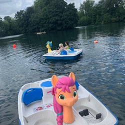 Size: 1080x1080 | Tagged: safe, imported from derpibooru, hitch trailblazer, sunny starscout, earth pony, human, pony, boat, bust, female, g5, irl, irl human, lake, london, lottie.london, male, mare, official, photo, stallion, tree