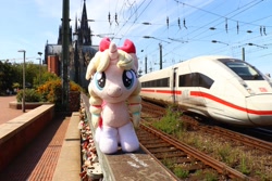 Size: 2048x1365 | Tagged: safe, artist:xeto_de, imported from derpibooru, oc, oc:lily allure, pony, unicorn, cathedral, church, cologne, cute, deutsche bahn, female, germany, irl, mare, photo, plushie, ponies in real life, train, train tracks