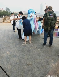 Size: 720x944 | Tagged: safe, imported from derpibooru, oc, oc:lyre wave, human, china, inflatable toy, irl, irl human, photo, qingdao, qingdao brony festival