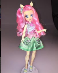 Size: 1080x1346 | Tagged: safe, artist:stephen sumner, imported from twibooru, fluttershy, equestria girls, clothes, doll, headband, image, needs more jpeg, photo, ponied up, prototype, shoes, skirt, toy