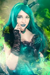 Size: 1365x2048 | Tagged: safe, artist:lochlan o'neil, imported from derpibooru, queen chrysalis, human, clothes, corset, cosplay, costume, fire, green fire, irl, irl human, lipstick, photo