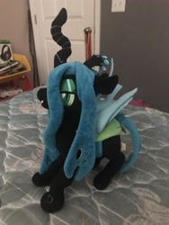 Size: 3024x4032 | Tagged: safe, artist:undeadponysoldier, imported from ponybooru, photographer:undeadponysoldier, queen chrysalis, changeling, bed, crown, door, irl, jewelry, lidded eyes, light switch, medal, photo, plushie, regalia, toy