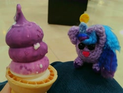 Size: 3072x2304 | Tagged: safe, artist:casquitos kawaii, imported from derpibooru, izzy moonbow, pony, unicorn, amigurumi, crochet, dairy queen, enjoying, food, g5, high res, ice cream, irl, photo, plushie, solo