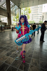 Size: 4000x6000 | Tagged: safe, artist:mieucosplay, imported from derpibooru, rarity, human, bronycon, bronycon 2017, equestria girls, friendship through the ages, ancient wonderbolts uniform, clothes, cosplay, costume, irl, irl human, peace sign, photo, sgt. rarity