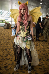 Size: 2751x4126 | Tagged: safe, imported from derpibooru, fluttershy, bat pony, human, bronycon, bronycon 2017, bare shoulders, bat ponified, clothes, converse, cosplay, costume, flutterbat, irl, irl human, photo, piercing, pink hair, race swap, ripped stockings, shoes, sleeveless, sneakers, stockings, thigh highs, torn clothes