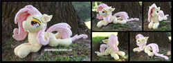Size: 4755x1754 | Tagged: safe, artist:peruserofpieces, imported from derpibooru, fluttershy, bat pony, pegasus, pony, bat ponified, bat wings, beanie (plushie), fangs, female, flutterbat, irl, looking at you, lying down, mare, photo, plushie, prone, race swap, solo, sploot, tree, wings