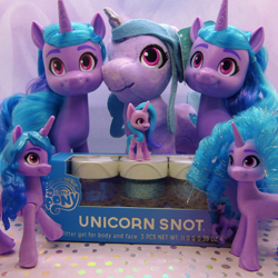 Size: 1158x1159 | Tagged: safe, imported from derpibooru, photographer:g5mlp, photographer:imiya, izzy moonbow, pony, unicorn, brushable, female, g5, izzystorm, mare, merchandise, multeity, my little pony logo, plushie, text, toy, unicorn charms izzy moonbow, unicorn snot