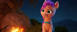 Size: 1366x570 | Tagged: safe, imported from derpibooru, screencap, sunny starscout, earth pony, pony, spoiler:my little pony: a new generation, 3d, campfire, female, g5, my little pony: a new generation, night, png, solo