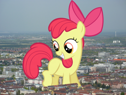 Size: 2000x1500 | Tagged: safe, artist:lilcinnamon, artist:thegiantponyfan, imported from derpibooru, apple bloom, earth pony, pony, apple bloom's bow, blank flank, bow, female, filly, germany, giant pony, giant/macro earth pony, giantess, hair bow, highrise ponies, irl, macro, mega apple bloom, mega giant, munich, photo, ponies in real life