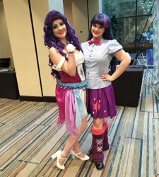 Size: 800x890 | Tagged: safe, artist:sarahndipity cosplay, artist:shelbeanie, imported from derpibooru, rarity, twilight sparkle, human, equestria girls, clothes, cosplay, costume, everfree northwest, everfree northwest 2018, hand on hip, high heels, irl, irl human, photo, shoes
