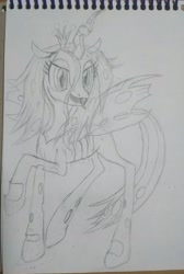Size: 2352x3502 | Tagged: safe, artist:dellarie, queen chrysalis, changeling, changeling queen, featured image, female, looking at you, open mouth, pencil drawing, raised hoof, solo, tongue out, traditional art