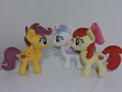 Size: 800x600 | Tagged: safe, artist:little-broy-peep, imported from derpibooru, apple bloom, scootaloo, sweetie belle, earth pony, pegasus, pony, unicorn, bow, cutie mark crusaders, female, filly, hair bow, irl, photo, plushie, trio