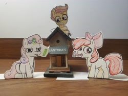 Size: 4032x3024 | Tagged: safe, artist:davierocket, imported from derpibooru, apple bloom, scootaloo, sweetie belle, earth pony, pegasus, pony, unicorn, :d, antique shop, craft, cutie mark crusaders, hammer, magic, open mouth, open smile, paper, papercraft, smiling, squint