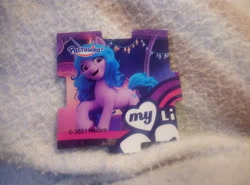 Size: 4192x3104 | Tagged: safe, imported from derpibooru, izzy moonbow, pony, unicorn, cute, cyrillic, danonino, g5, izzybetes, jigsaw, looking at you, magnet, merchandise, my little pony: a new generation, photo, rastishka, russian