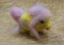 Size: 1137x799 | Tagged: safe, artist:dogisaga, imported from derpibooru, fluttershy, earth pony, pony, earth pony fluttershy, female, irl, needle felted, photo, plushie, race swap, smol, solo