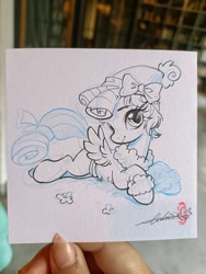 Size: 1536x2048 | Tagged: safe, artist:paipaishuaige, imported from derpibooru, cozy glow, pegasus, pony, bow, looking at you, lying down, photo, sketch, smiling, solo, traditional art