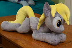 Size: 1280x854 | Tagged: safe, artist:azgchip, imported from derpibooru, derpy hooves, pegasus, pony, female, irl, lying down, mare, missing cutie mark, photo, plushie, solo