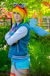 Size: 822x1242 | Tagged: safe, artist:brawny buck, imported from derpibooru, rainbow dash, human, clothes, cosplay, costume, crossed arms, everfree northwest, everfree northwest 2015, goggles, irl, irl human, multicolored hair, photo, rainbow hair