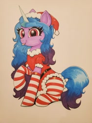 Size: 768x1024 | Tagged: safe, artist:confetticakez, imported from derpibooru, izzy moonbow, pony, unicorn, :p, christmas, clothes, costume, female, g5, hat, holiday, my little pony: a new generation, santa costume, santa hat, simple background, socks, solo, striped socks, tan background, tongue out, traditional art