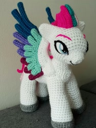 Size: 1588x2117 | Tagged: safe, artist:alilycrochet, imported from derpibooru, zipp storm, pegasus, pony, crochet, eyebrows, female, g5, irl, mare, my little pony: a new generation, photo, plushie, smiling, solo, spread wings, standing, wings