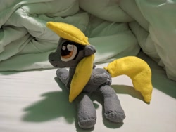Size: 4032x3024 | Tagged: safe, artist:shuffle, derpy hooves, pegasus, pony, bed, female, irl, mare, photo, plushie, solo