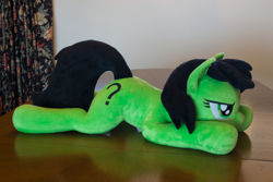 Size: 5184x3456 | Tagged: safe, artist:azgchip, imported from derpibooru, oc, oc:filly anon, earth pony, pony, commission, cute, female, filly, grumpy, irl, lying down, mare, photo, plushie, prone, solo, sploot