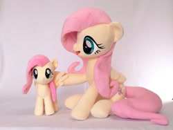 Size: 1024x768 | Tagged: safe, artist:nekokevin, imported from derpibooru, fluttershy, pegasus, pony, cute, daaaaaaaaaaaw, doll, duality, duo, duo female, female, g4, looking at each other, looking at someone, open mouth, plushie, self paradox, self plushidox, self ponidox, shyabetes, simple background, size difference, smiling, toy, wings