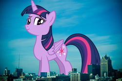 Size: 2048x1362 | Tagged: safe, artist:gamemasterluna, artist:jaredking779, imported from derpibooru, twilight sparkle, alicorn, pony, female, folded wings, giant alicorn, giant pony, giantess, highrise ponies, irl, looking at you, macro, mare, mega giant, milwaukee, photo, ponies in real life, smiling, solo, twilight sparkle (alicorn), twizilla, wings, wisconsin