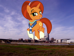 Size: 2816x2112 | Tagged: safe, artist:cheezedoodle96, artist:jaredking779, edit, imported from derpibooru, stellar flare, pony, unicorn, coat markings, female, giant pony, giant stellar flare, giant unicorn, giantess, grin, high res, highrise ponies, irl, jewelry, looking at you, macro, mare, mega giant, nebraska, necklace, omaha, pearl necklace, photo, ponies in real life, smiling, socks (coat markings), solo, standing on two hooves