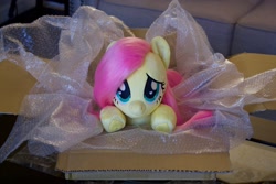 Size: 2100x1400 | Tagged: safe, artist:buttercupbabyppg, artist:natureshy, imported from derpibooru, fluttershy, pony, box, bubble wrap, cute, flutterbox, heart, heart eyes, hoof heart, irl, photo, plushie, shyabetes, solo, wingding eyes