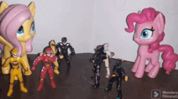 Size: 1282x720 | Tagged: safe, artist:dex stewart, imported from derpibooru, fluttershy, pinkie pie, earth pony, pegasus, pony, animated, g4.5, irl, merchandise, photo, power rangers dino thunder, sound, stop motion, toy, webm
