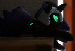 Size: 2932x1992 | Tagged: safe, artist:bastler, imported from derpibooru, nightmare moon, alicorn, pony, female, glow in the dark, glowing, glowing cutie mark, glowing eyes, irl, mare, photo, plushie