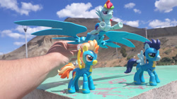 Size: 1280x720 | Tagged: safe, artist:dingopatagonico, imported from derpibooru, rainbow dash, soarin', spitfire, human, pegasus, pony, guardians of harmony, irl, irl human, photo, toy