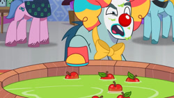 Size: 3072x1727 | Tagged: safe, imported from derpibooru, screencap, earth pony, pony, spoiler:g5, spoiler:my little pony: tell your tale, spoiler:tyts01e30, apple, clown, clown makeup, clown nose, female, food, g5, high res, male, mare, my little pony: tell your tale, nightmare night party, open mouth, red nose, rufus (g5), solo focus, stallion, unnamed character, youtube link