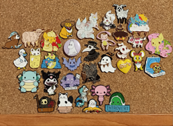 Size: 909x663 | Tagged: safe, imported from derpibooru, applejack, fluttershy, rainbow dash, earth pony, pegasus, pony, chibi, collection, cute, enamel pin, food, furry, horror, moomins, photo, pizza, pokémon, the nightmare before christmas