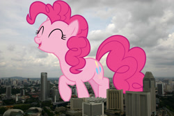 Size: 1000x667 | Tagged: safe, artist:cloudyglow, artist:jaredking779, imported from derpibooru, pinkie pie, earth pony, pony, eyes closed, female, giant pinkie pie, giant pony, giant/macro earth pony, giantess, highrise ponies, irl, macro, mare, mega giant, open mouth, photo, ponies in real life, singapore, smiling, solo
