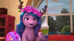 Size: 1280x712 | Tagged: safe, imported from derpibooru, screencap, izzy moonbow, spoiler:g5, spoiler:winter wishday, animated, chocolate, chuckle, cup, elderly, floral head wreath, flower, flower in hair, food, g5, glasses, grandma figgy, hot chocolate, indoors, laughing, marshmallow, sipping, sound, tree branch, webm, winter wishday, wreath