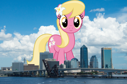 Size: 2447x1627 | Tagged: safe, imported from derpibooru, lily, lily valley, earth pony, pony, background pony, female, florida, flower, flower in hair, giant pony, giant/macro earth pony, giantess, high res, highrise ponies, irl, jacksonville, lily (flower), macro, mare, mega giant, photo, ponies in real life